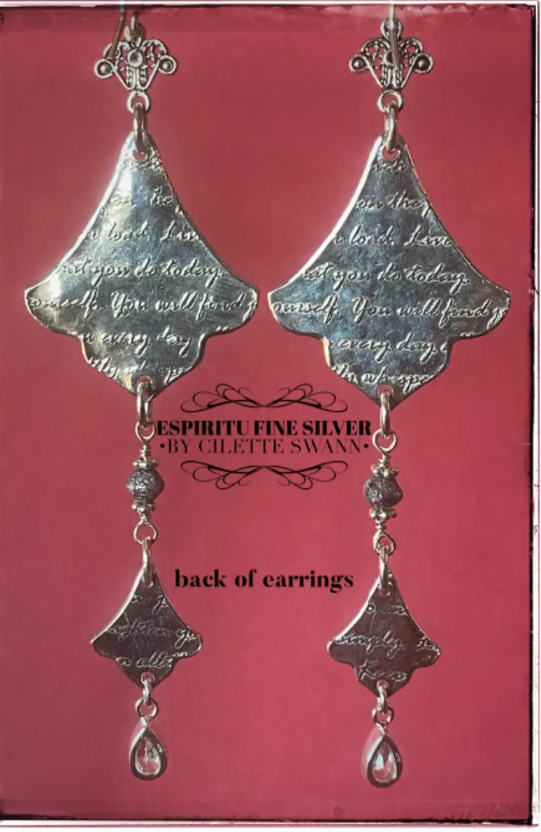 Fine silver earrings bearing an original lyric